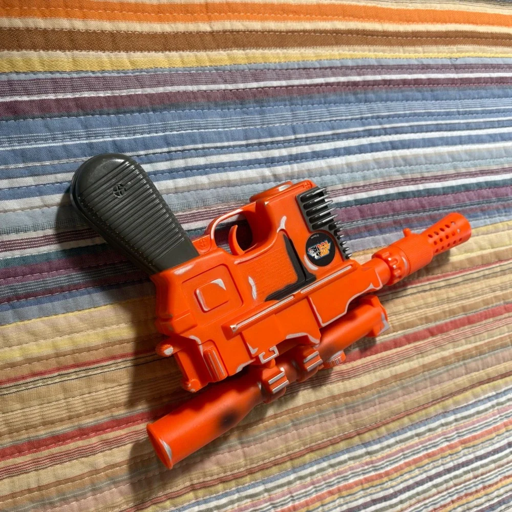 Disney Star Tours Star Wars Han Solo DL-44 Blaster Toy Orange Silver Weathered